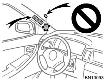 Likewise, the driver and front passenger should not hold objects in their arms or on their knees.