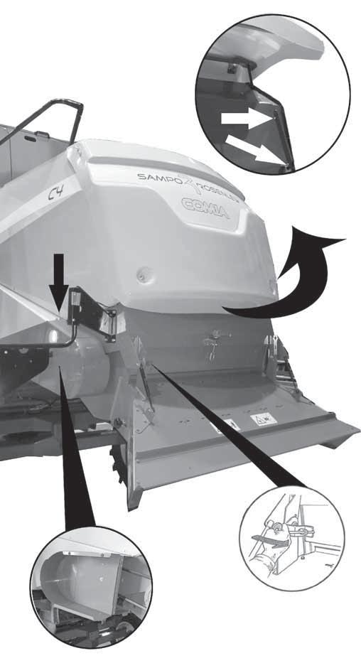 The rear guard of the chopper (straw spreader) is released by levering the locking pivot to the right with the tool. The guard also gets locked in the upper position and is released correspondingly.