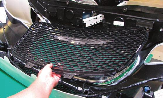 Work your way around the sides of the grille until the bottom and sides are