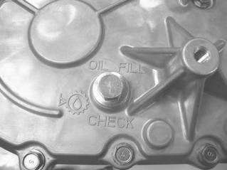 MAINTENANCE Transmission Oil Maintain the oil level at the bottom of the fill plug hole threads. Use the recommended oil. See page 128 for the part numbers of Polaris products.