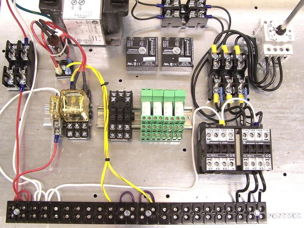 COMPONENT MOUNTING CONTINUED: 7. Place the supplied 6 din rail to the right of the safety relay (Figure 3).