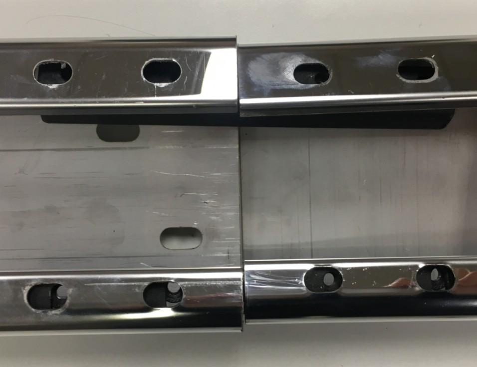 Obtain both sections of the Step Bar Assembly (1 or 2).