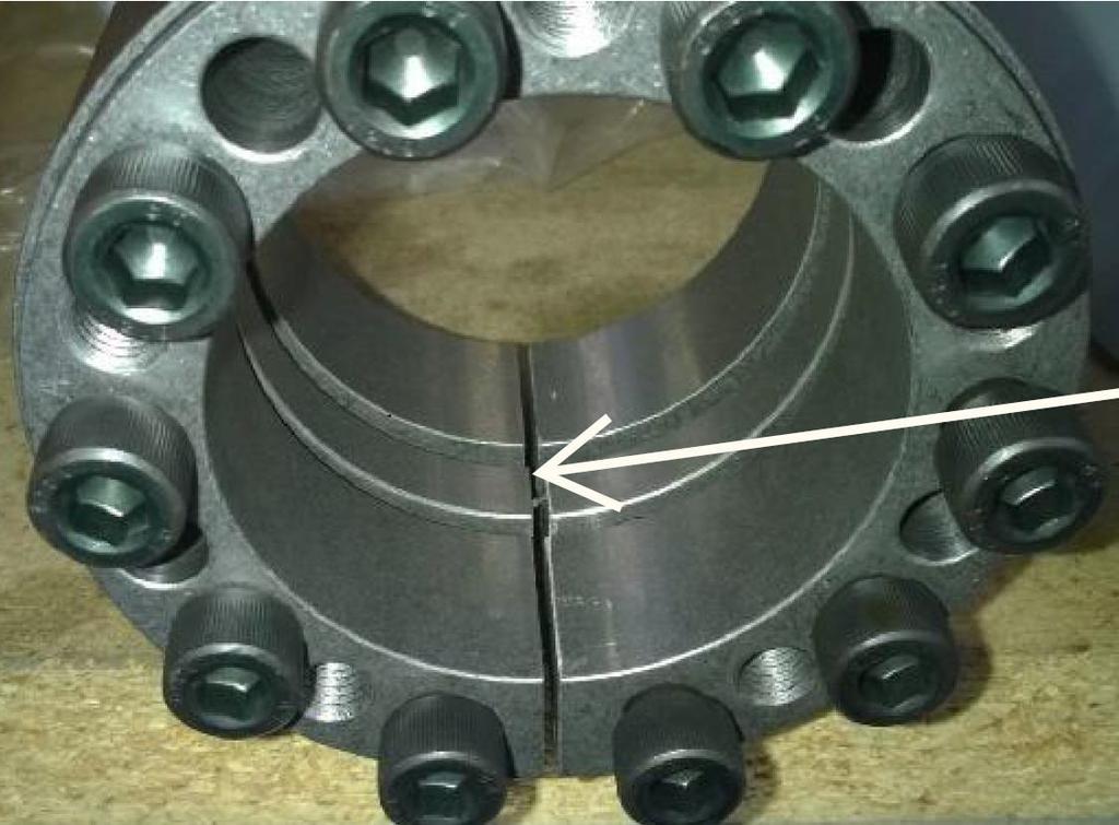 Grasso V 700.. 1800; MOUNTING FLYWHEEL(0087168) Fig.21: Gap in the inside clamping element must be in line with the gap in the outer ring Assembly 1.