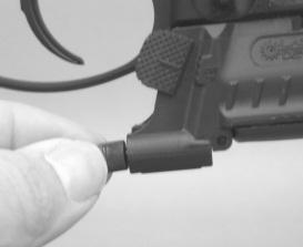 24 Figure 17 Removing the Windage/Elevation Tool Step 1. A built-in windage and elevation adjustment tool is located on the right side just below the trigger guard. Step 2.