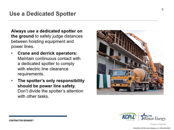 Use a dedicated spotter when working with heavy equipment around overhead lines.
