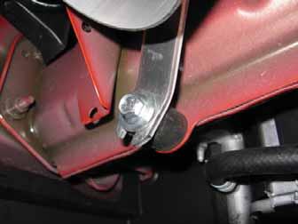 Now secure the intake tube bracket to the insulated rubber mount using the