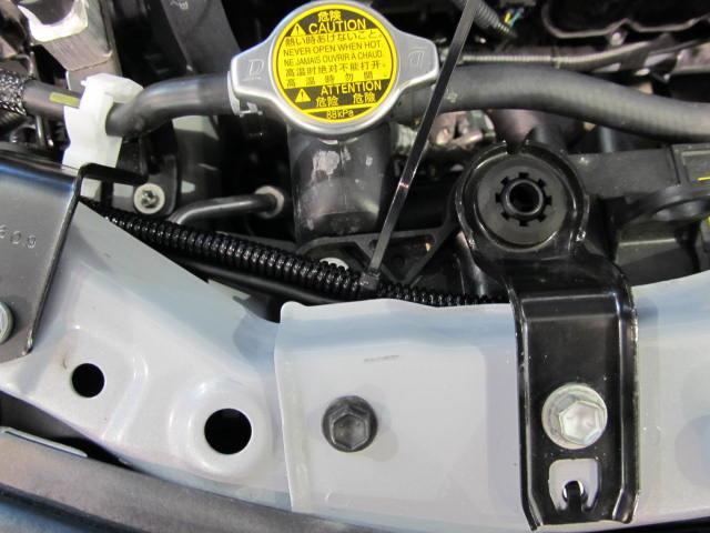 Plug in left side DRL into harness plug and secure with wire tie