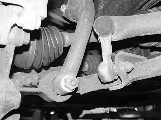 Fig 3 Fig 4 8. Remove the strut from the vehicle. 9. Mark the relationships between the top strut plate, coil spring, coil spring mount and strut (Fig. 5). Also mark what side of the strut faces out.