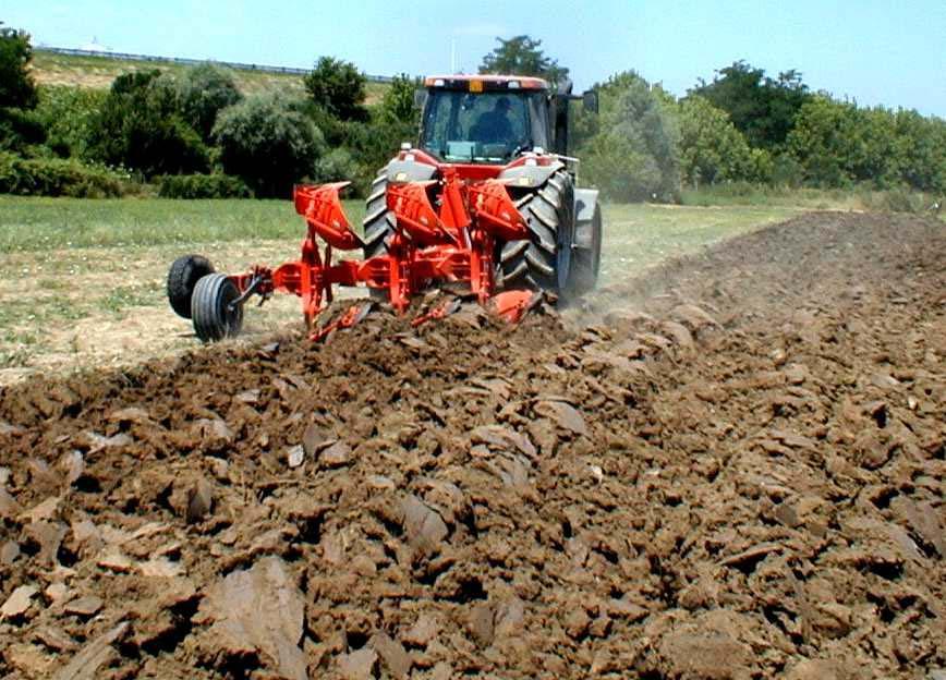 of the plough in the out-of-furrow and infurrow configurations, thus the choice may be based on the comfort of the driver and the reduction in damage caused by soil compacting and tyre consumption;