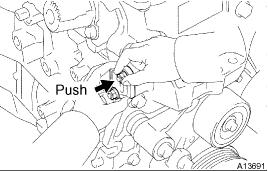 b. Place a new gasket on the timing chain cover with portion A facing as shown in the illustration. c. Push the chain tensioner into the timing chain cover, and install the 2 nuts. Torque:9.