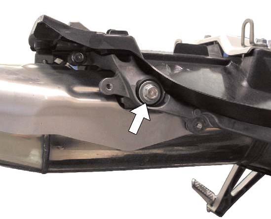 23)Remove the bolt & nut that secures the front of the muffler heatshield to the subframe.