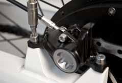 To adjust the brakes, the two screws found on the brake should be loosened, so that the unit sits loosely on the handle bar and has room to move.