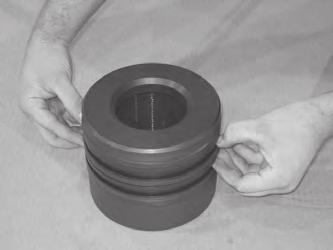 Using the O-ring installation tool, insert the O-ring in the groove between the seal protector