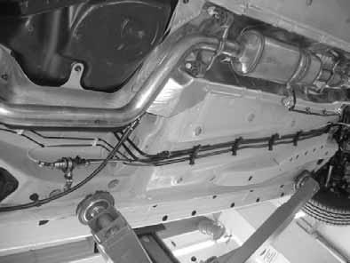 Mount the fuel line and wiring harness with rub protection on sharp edges. WRNING! The fuel line and wiring harness are routed to the metering pump in as shown in the wiring harness routing diagram.