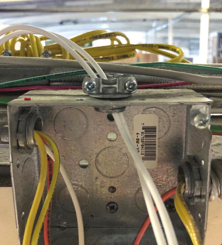 8. Open the junction box with your emergency power circuit and identify the circuit you will be using is turned oﬀ at this time. 9. Remove (2) ½ knockouts from your junction box.