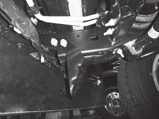 Remove Compatibility Structures 5. Position the rear bracket as shown, ensuring that the stabilizer bar bolts protrude through the rear bracket.