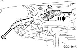 Page 8 of 14 3. NOTE: Make sure the steering gear control valve housing is turned toward the front of the vehicle. Install the steering gear into the RH opening of the crossmember. 4.