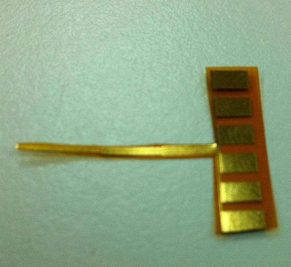 Sensors 2015, 15 11489 Figure 3. Finished product and optical micrograph of the flexible three-in-one microsensor.