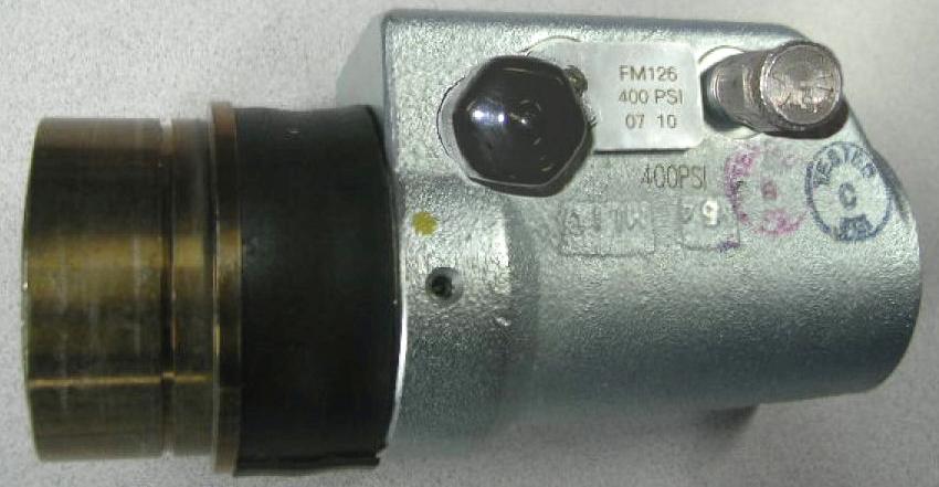 Install a /4 NPT Hydrostat Fitting into the forward port on the Outlet Body and a Bleed Valve into the rear port on the Outlet Body. These components MUST be installed at the locations shown at right.