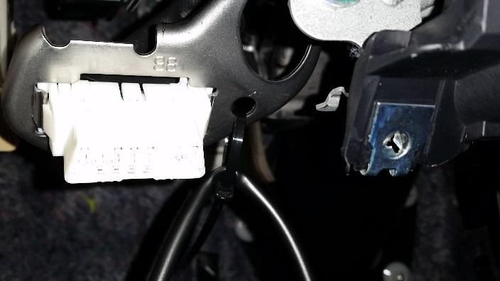 Route additional connector to driver side foot-well light, wire tying to OBD2