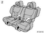 Then slide the rear seat fully backward and pull it forward slightly until it locks. 3. Lower the head restraint to the lowest position.