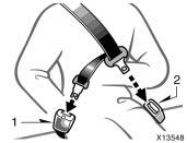 Make sure that buckle 1 (with light gray buckle- release button) is securely latched for ready use of the center seat belt.