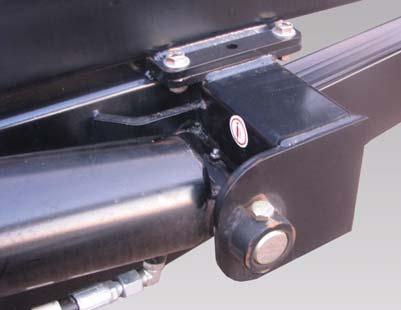 grease to both ends of the swing arm cylinder (Item )