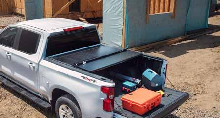 look 2 HARD ROLLING TONNEAU COVER BY REV Combines cargo protection with full-bed access Rolls easily to the cab when the tailgate is unlocked/lowered and the release is pulled Features a rugged
