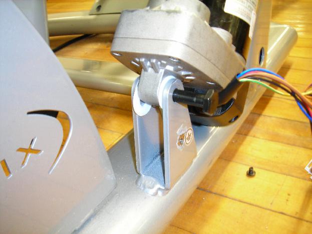 (Figure F). figure e figure f 10) Install the new motor using the plastic washers (Figure G).