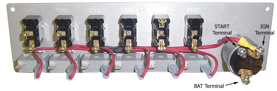 panel. Follow this same procedure for installing the push button circuit breakers.