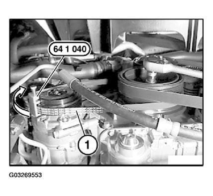 Fig. 236: Installing Drive Belt On Pulley 11 28 050 REPLACING A/C COMPRESSOR DRIVE BELT WITH BELT TENSIONER (N62/N62TU) NOTE: For Special Tool identification, see ENGINE- SPECIAL TOOLS - 5-SERIES