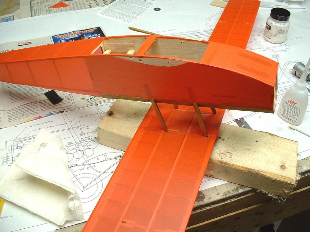 This should counter adverse aileron yaw. Page 5 Apply epoxy to the wing rib that meets the fuselage. Attach the wings to the fuselage.