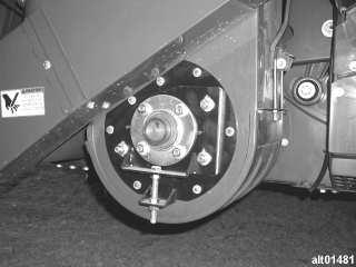 Ag Leader Technology 4. Install lower adjuster assembly on cross auger shaft and secure to elevator boot using (7) nuts and flat washers that were removed in step 3. See Figure 18. 5.
