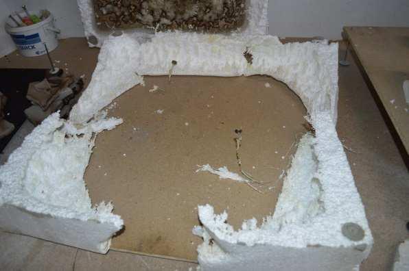 The EPS insulation has melted in a large area, except along the outer edges of the test specimen.