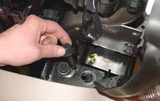 B) then remove four bolts, two on the top of each frame tube (Fig. C).
