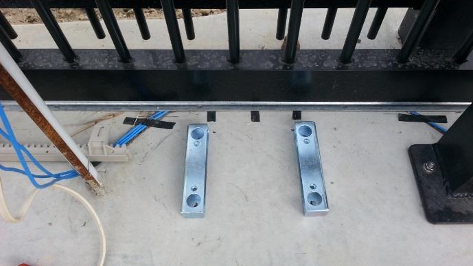 allow for the fastener thickness after installation. Open/close the gate as the gate may have a bend in it. There are 3 typical ways to fasten the motor to your concrete.