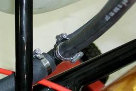 8 THE THERMOSTAT MUST BE POSITIONED SO THAT THE REAR UNION FOR THE RECYCLING COOL WATER IS PROPERLY FIXED TO THE "T" FITTING ON THE HOSE CONNECTING THE RADIATOR OUTLET TO THE ENGINE INLET FITTING