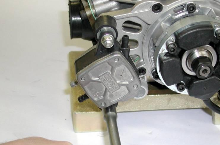 DAMPENERS ON THE GEAR BOX COVER I (SEE FIG. 6).