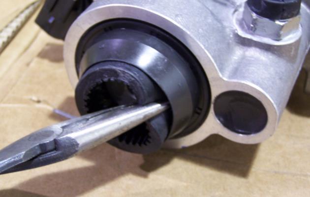 5. Install new pilot bearing assembly using a bearing driver or a socket of similar diameter to the bearing and a mallet.