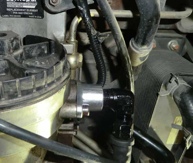 Figure 22 Step 28: Install the afe Fuel Pump Adapter onto the stock fuel filter housing using 2 of