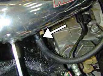 Plug the lower end of the factory fuel pressure regulator hard