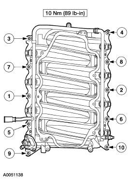 15. Disconnect the fuel charging wiring harness from the rear of the lower intake manifold. Remove the manifold. 16. Remove the intake manifold gaskets. Clean and inspect the sealing surfaces.