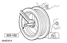 2. Using the special tool, install the crankshaft pulley. 3. Install the bolt and washer.