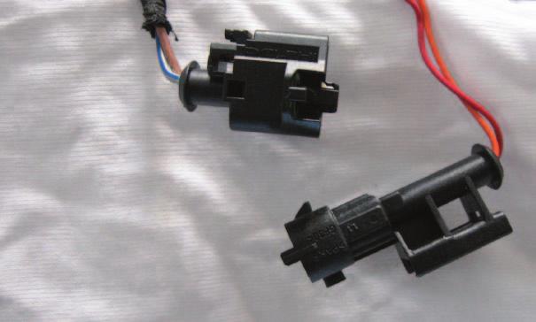 FIG.G Locking tab Slanted tab NOTE: The stock Ignition Coil connectors can be connected to the Ignition Module harness upside down.