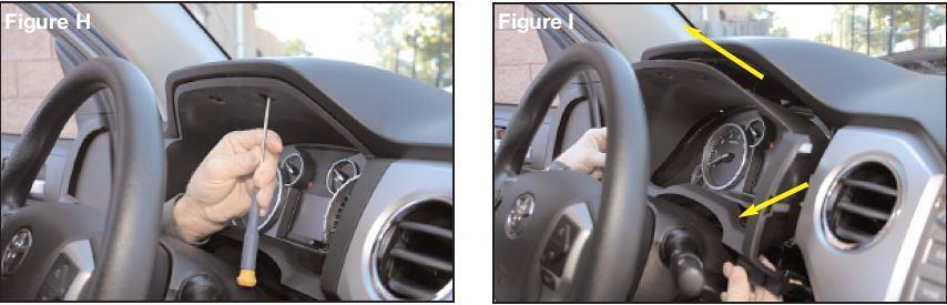 driver or an awl. Push in on the center of the two (2) retaining clips located at the top of the trim panel.