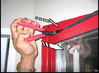 Open the door to access the hold open device then loosen and remove hold-open bolt, using a phillips-head screwdriver. Refer to figure (B) A B 5.