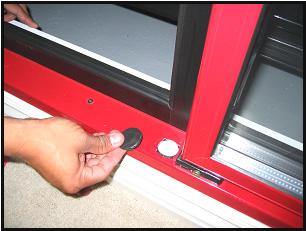 Locate the mounting hole at the opposite side of the door opening. 3.
