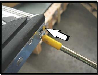 5. Reverse the process to re-install the torque rod assembly into the door rail.