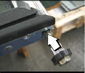 If required, tap the torque rod assembly into the door rail using a plastic or rubber mallet, until the torque rod is fully seated into the door rail