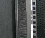 Vertical Brush Strips Designed to control airflow in the rack.